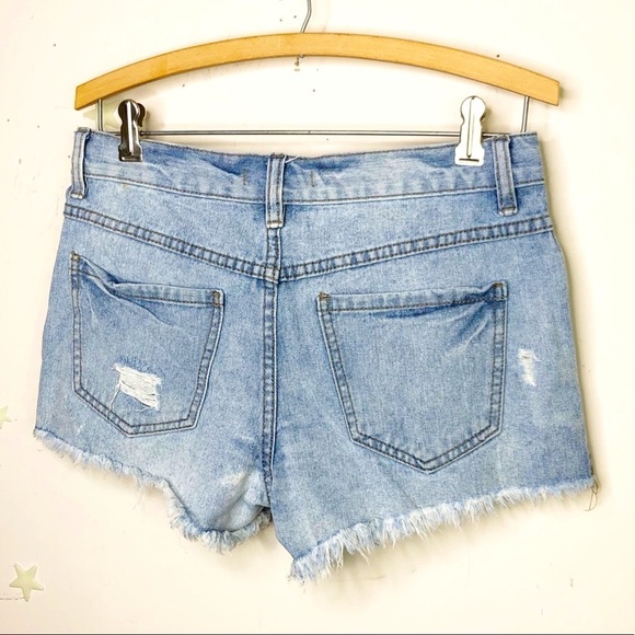 FREE people button fly, raw hem distressed shorts - Picture 4 of 10